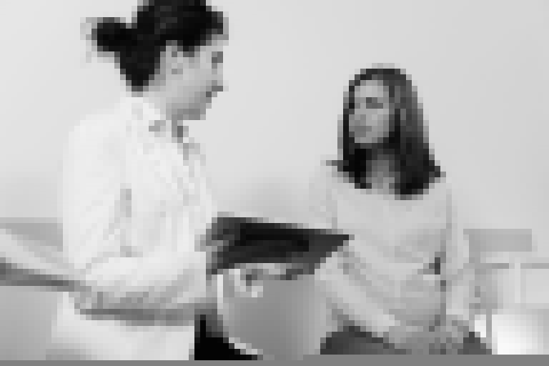 Doctor speaking to patient